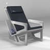 Fauteuil de lecture gris clair, taillé sur-mesure, dossier haut avec appui-tête. Liseuse en option